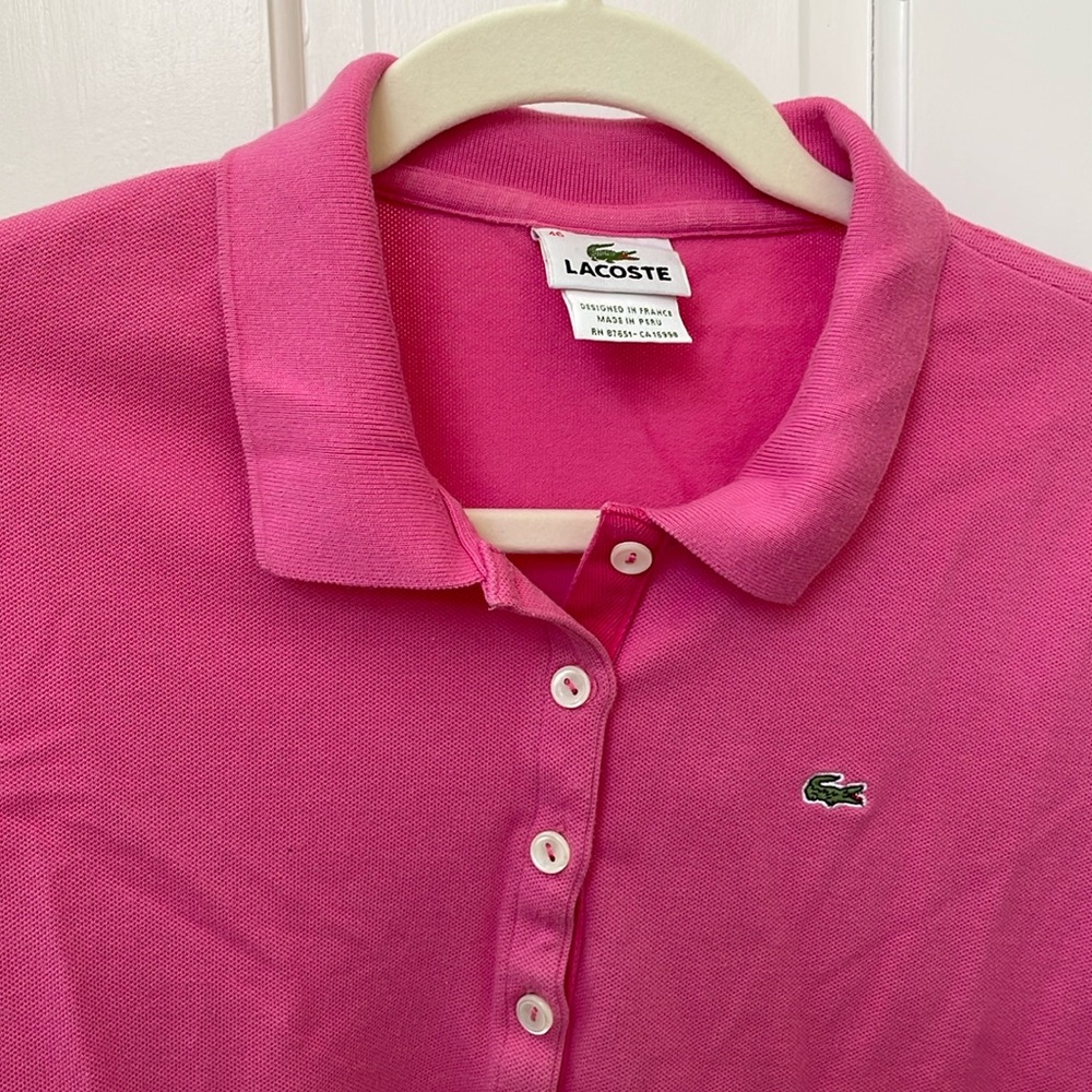 Lacoste, women’s long sleeve, 4-button, classic polo in magenta.